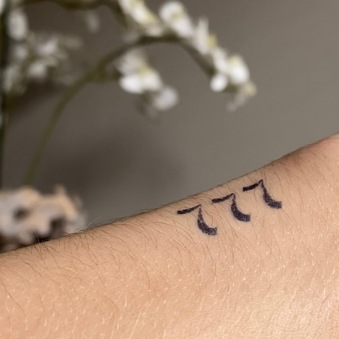 Temporäres Tattoo 777